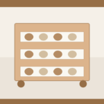 Rolling pantry cart with baskets organizing dry goods in a small rental kitchen