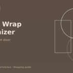 Foil and plastic wrap organizer mounted inside a rental kitchen cabinet