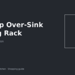 Roll-up over-sink dish drying rack spanning a tiny apartment kitchen sink