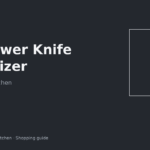 In-drawer knife organizer with guarded slots in a small rental kitchen