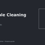 Portable cleaning caddy tucked under a rental kitchen sink around pipes