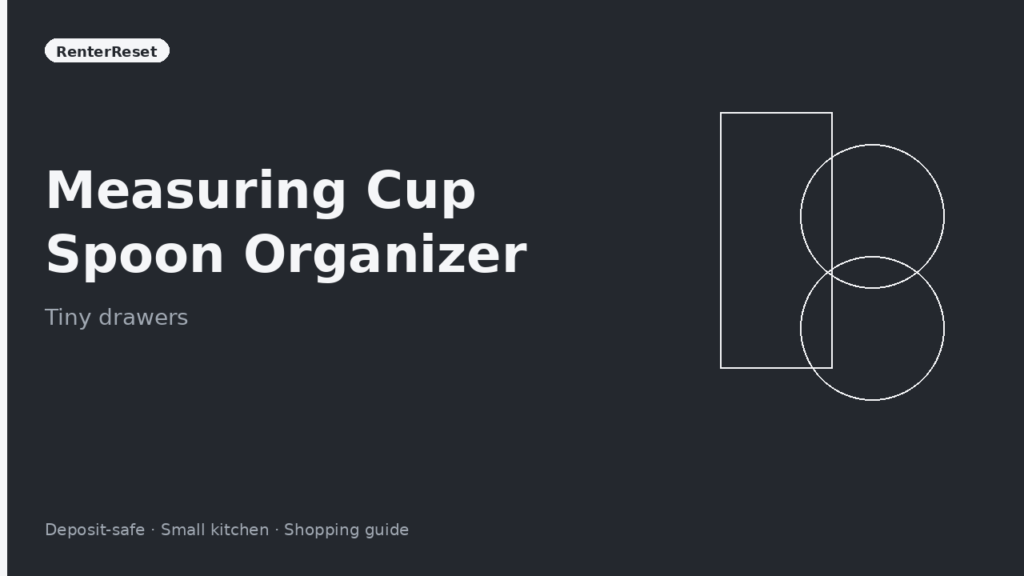 Measuring cups and spoons nested in a tiny rental kitchen drawer organizer
