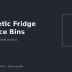 Magnetic produce bin stuck to the side of an apartment fridge holding onions and citrus