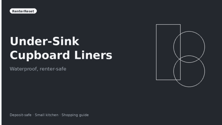 Waterproof under-sink cupboard liner cut to fit around pipes in a rental cabinet
