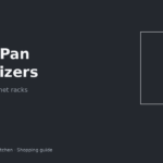 Vertical pot and pan organizer holding skillets in a narrow apartment base cabinet