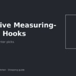 Measuring spoons hanging on adhesive hooks inside a rental kitchen cabinet door
